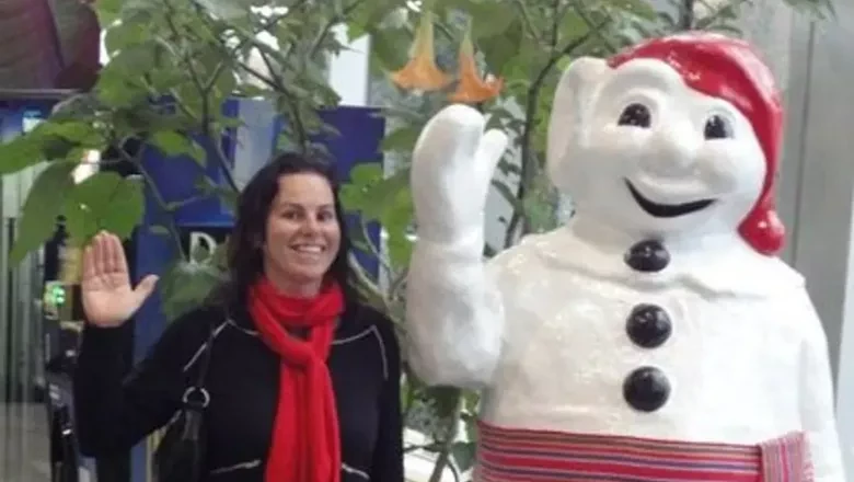 Photo of Fiona Ardasinski standing beside a large snowman statue, used to highlight career development at BCA.